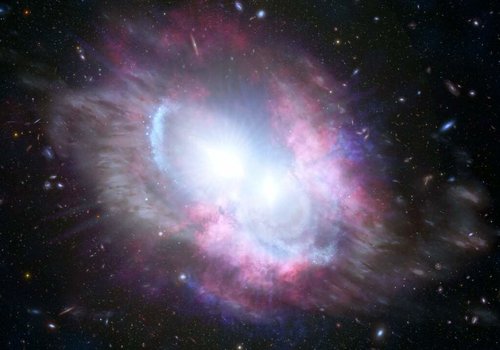 Два квазара ярко сияют в центре галактического слияния